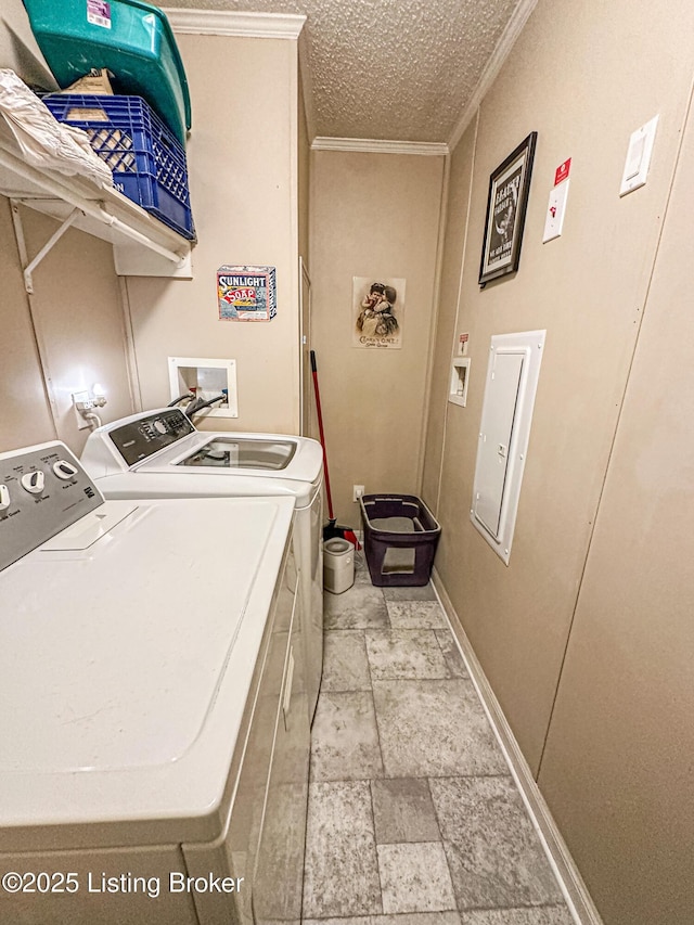 1073 Post-Tousey Rd Unit C, Caneyville, KY 42721 - washroom with separate washer and dryer, crown molding, light stone finish floors, baseboards, and a textured ceiling
