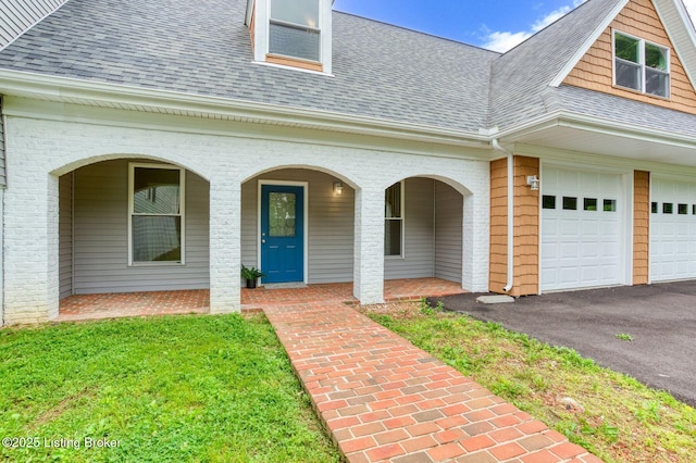 2519 Belknap Beach Rd, Prospect, KY 40059 - view of front of home featuring roof with shingles, covered porch, and driveway