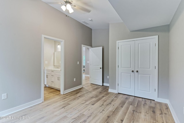 2519 Belknap Beach Rd, Prospect, KY 40059 - unfurnished bedroom featuring light wood-style flooring, a closet, baseboards, and ensuite bathroom