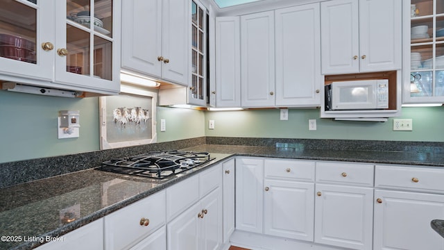 316 E Cross Main St, New Castle, KY 40050 - kitchen featuring white microwave, black gas cooktop, and white cabinets