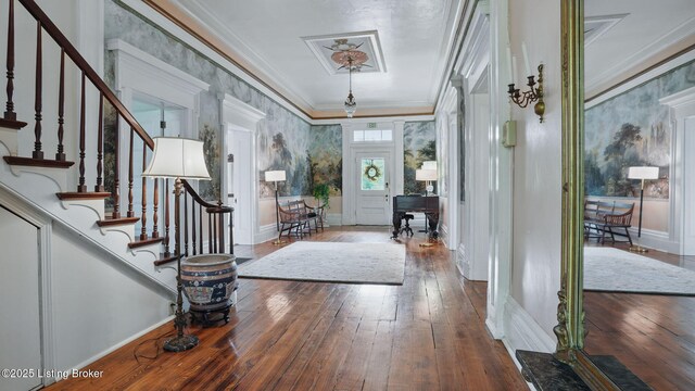 316 E Cross Main St, New Castle, KY 40050 - entrance foyer with wood-type flooring, ornamental molding, stairway, and baseboards