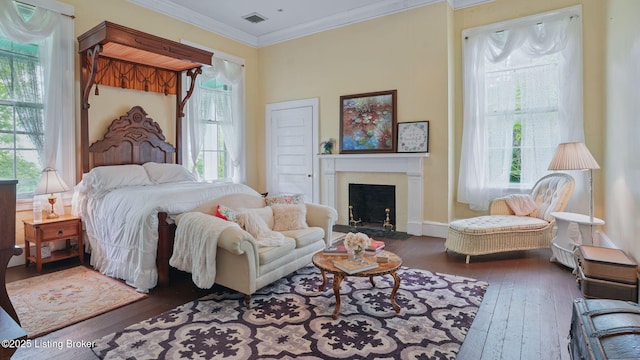 316 E Cross Main St, New Castle, KY 40050 - bedroom featuring hardwood / wood-style flooring, multiple windows, ornamental molding, and a fireplace with flush hearth