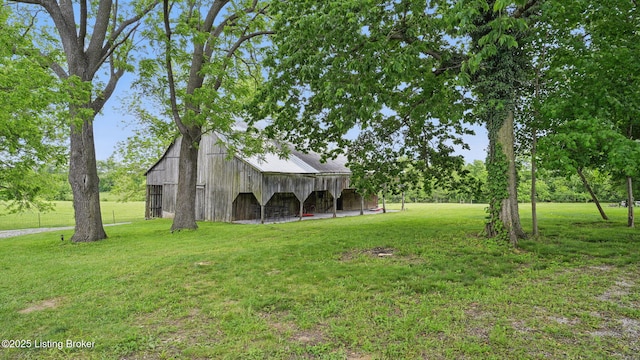 316 E Cross Main St, New Castle, KY 40050 - view of grassy yard with a barn and an outdoor structure
