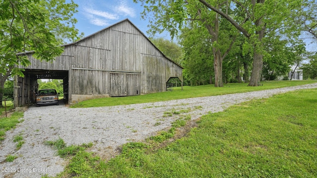 316 E Cross Main St, New Castle, KY 40050 - view of barn featuring a yard and gravel driveway