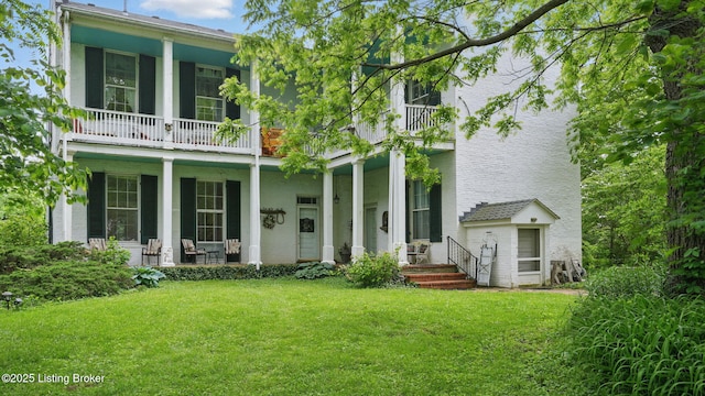 316 E Cross Main St, New Castle, KY 40050 - rear view of house with a yard, a balcony, and a porch