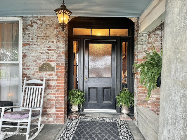 218 Locust St, Jeffersonville, IN 47130 - entrance to property featuring brick siding