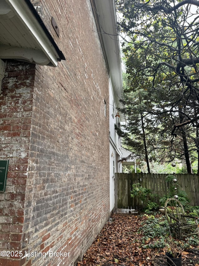 218 Locust St, Jeffersonville, IN 47130 - view of property exterior with brick siding