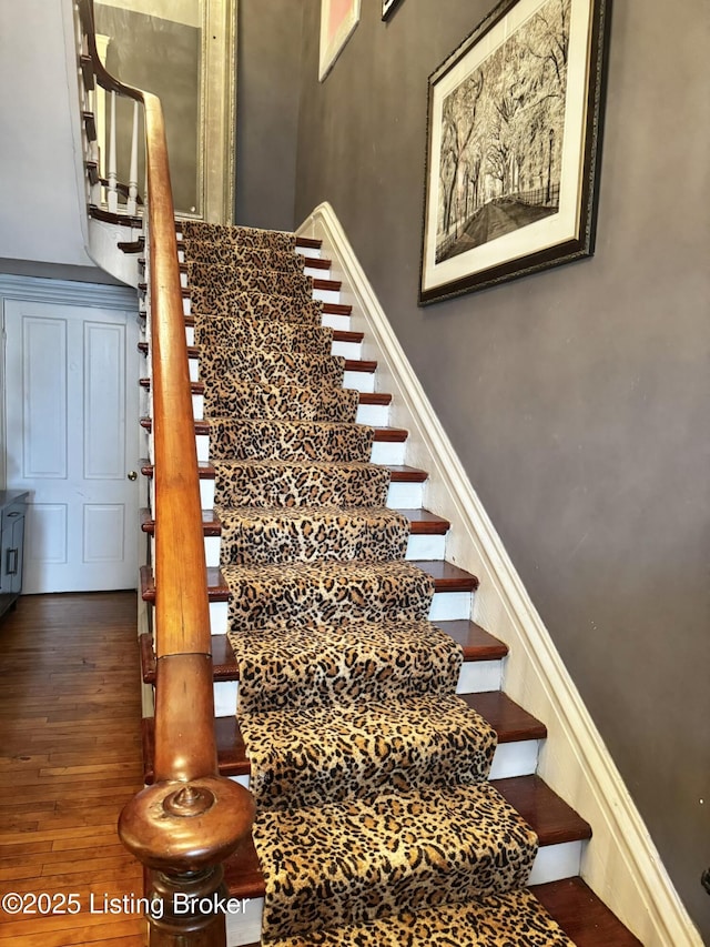 218 Locust St, Jeffersonville, IN 47130 - stairway featuring wood finished floors