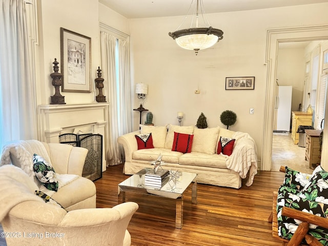 218 Locust St, Jeffersonville, IN 47130 - living area featuring wood finished floors and a fireplace
