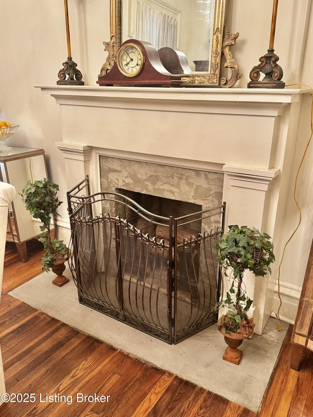 218 Locust St, Jeffersonville, IN 47130 - detailed view of wood finished floors and a high end fireplace