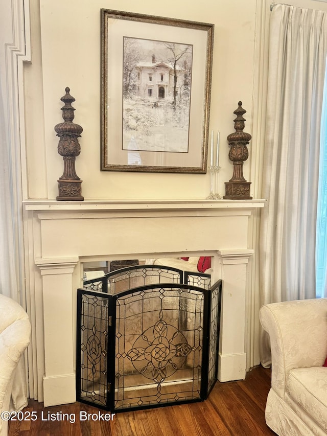 218 Locust St, Jeffersonville, IN 47130 - detailed view of wood finished floors and a fireplace