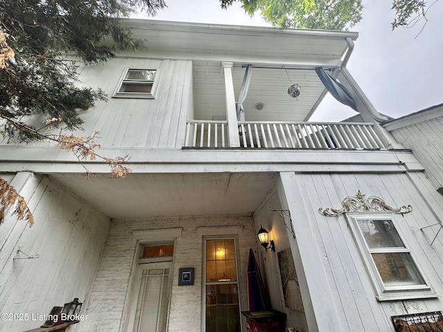 218 Locust St, Jeffersonville, IN 47130 - doorway to property featuring a balcony