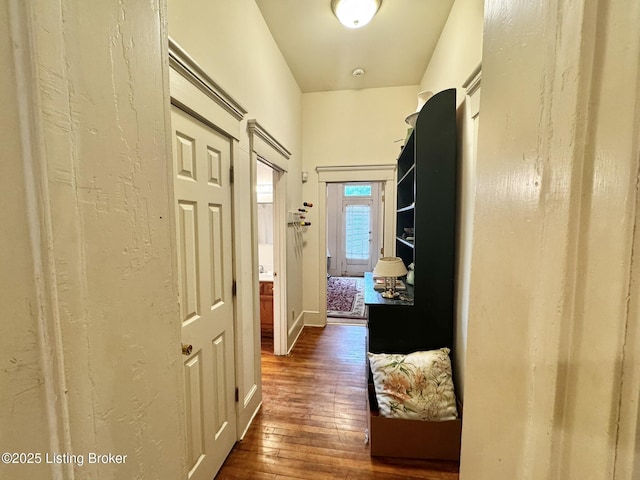 218 Locust St, Jeffersonville, IN 47130 - hallway with dark wood-style flooring and baseboards