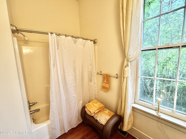 218 Locust St, Jeffersonville, IN 47130 - full bathroom with shower / tub combo with curtain and wood finished floors