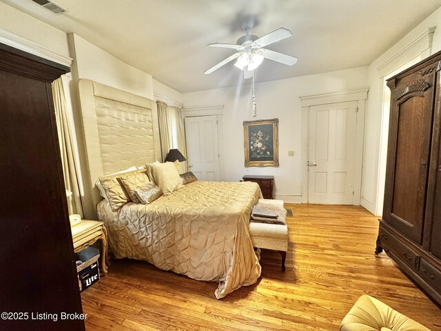 218 Locust St, Jeffersonville, IN 47130 - bedroom featuring light wood-style floors and a ceiling fan