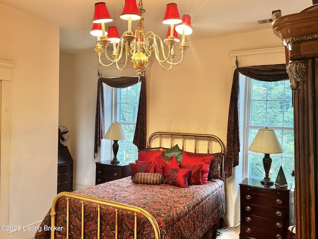 218 Locust St, Jeffersonville, IN 47130 - bedroom with a chandelier and multiple windows
