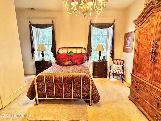 218 Locust St, Jeffersonville, IN 47130 - bedroom featuring a chandelier, light colored carpet, and multiple windows