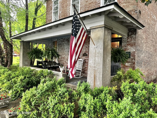 218 Locust St, Jeffersonville, IN 47130 - view of side of home with brick siding