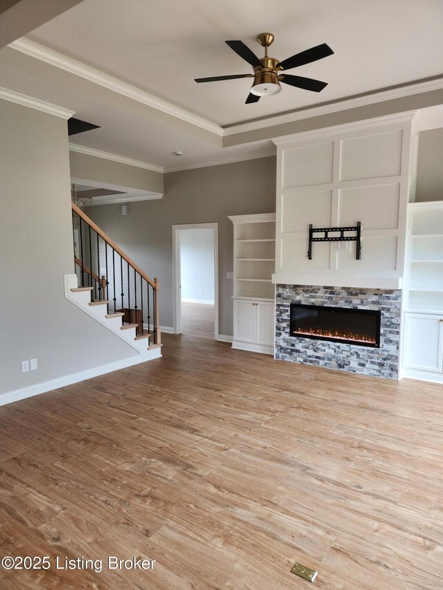 42 Lincoln Hill Way, Louisville, KY 40245 - unfurnished living room with wood finished floors, crown molding, baseboards, a fireplace, and ceiling fan