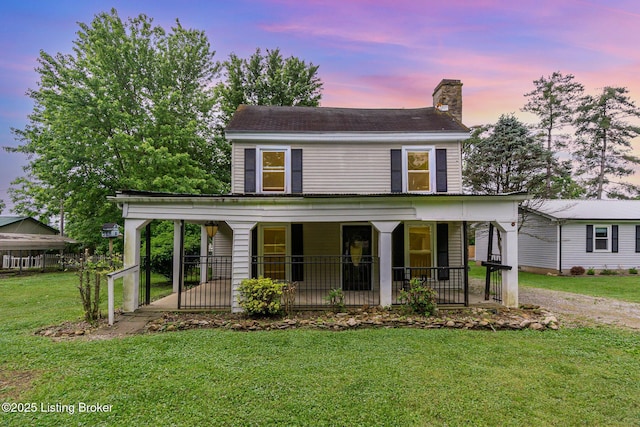 793 Samuels Loop, Coxs Creek, KY 40013 - view of front of home with a porch, a chimney, and a front lawn