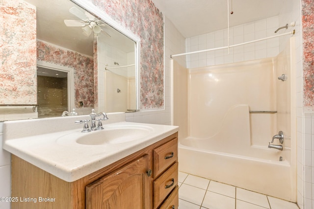 793 Samuels Loop, Coxs Creek, KY 40013 - bathroom with ceiling fan, vanity, wallpapered walls, tile patterned floors, and bathtub / shower combination