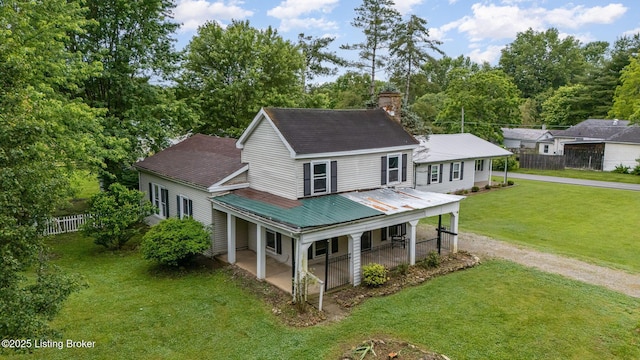 793 Samuels Loop, Coxs Creek, KY 40013 - rear view of house with covered porch, dirt driveway, a chimney, and roof with shingles
