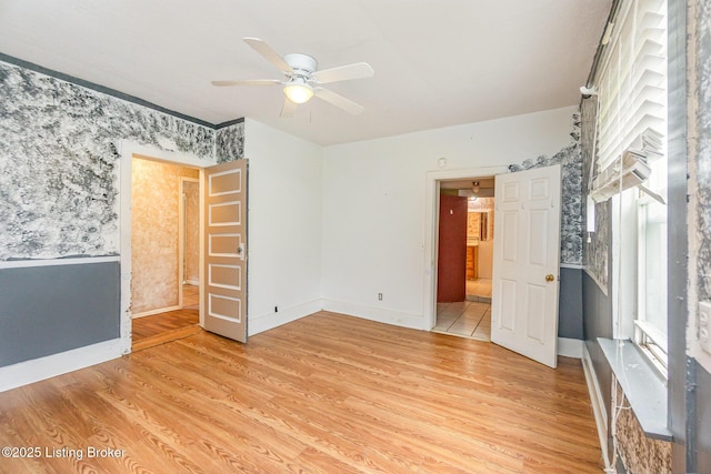 793 Samuels Loop, Coxs Creek, KY 40013 - empty room featuring a ceiling fan, light wood finished floors, plenty of natural light, baseboards, and wallpapered walls