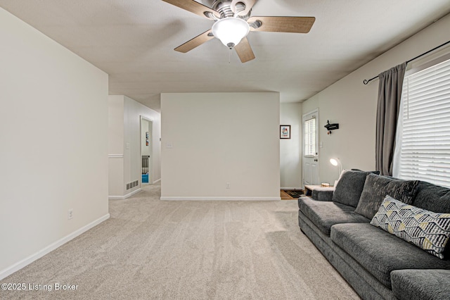 7020 Field View Ct, Louisville, KY 40291 - living area with light carpet, a ceiling fan, and baseboards