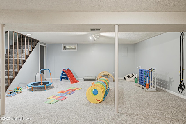 7020 Field View Ct, Louisville, KY 40291 - playroom with carpet flooring, baseboards, and a textured ceiling