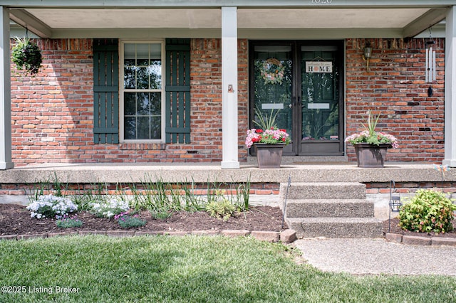 7020 Field View Ct, Louisville, KY 40291 - view of exterior entry featuring covered porch and brick siding