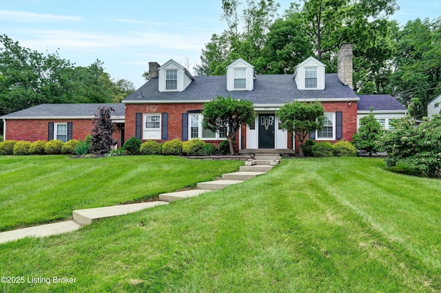 2501 Newburg Rd, Louisville, KY 40205 - cape cod home with a chimney, brick siding, and a front yard