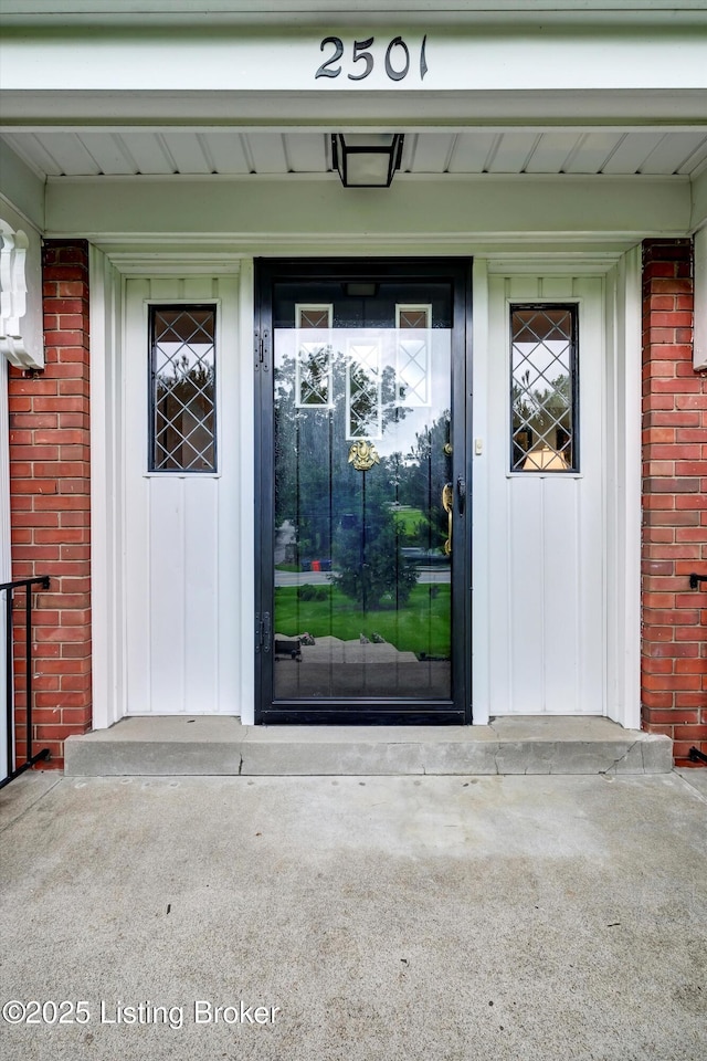 2501 Newburg Rd, Louisville, KY 40205 - property entrance with brick siding and covered porch