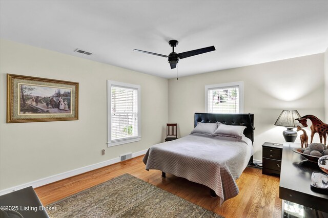 2501 Newburg Rd, Louisville, KY 40205 - bedroom with light wood finished floors, baseboards, and ceiling fan
