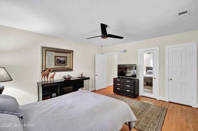 2501 Newburg Rd, Louisville, KY 40205 - bedroom featuring light wood finished floors, baseboards, and ceiling fan