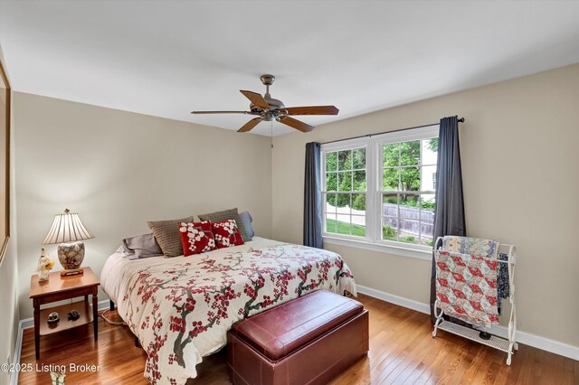 2501 Newburg Rd, Louisville, KY 40205 - bedroom featuring wood finished floors, baseboards, and ceiling fan