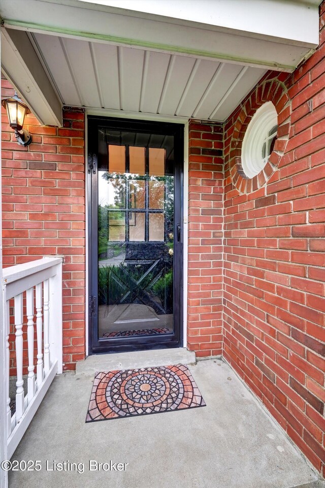 2501 Newburg Rd, Louisville, KY 40205 - doorway to property with brick siding