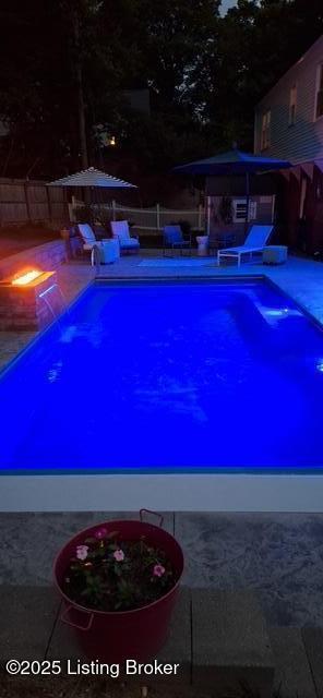 2501 Newburg Rd, Louisville, KY 40205 - view of swimming pool with an outdoor fire pit and a patio area