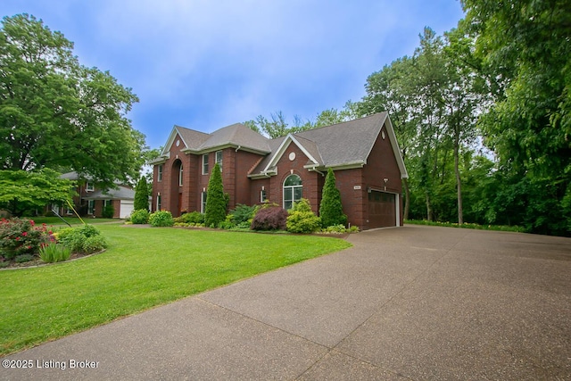 9200 Axminster Dr, Louisville, KY 40299 - view of front facade featuring a garage, a front lawn, asphalt driveway, and brick siding
