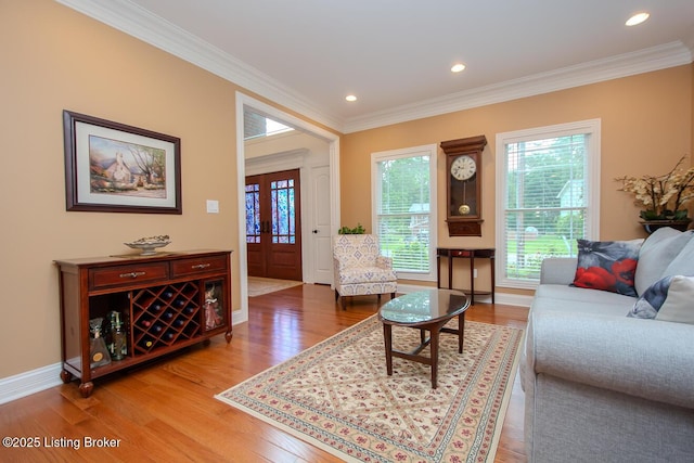 9200 Axminster Dr, Louisville, KY 40299 - living area with wood finished floors, ornamental molding, baseboards, and recessed lighting