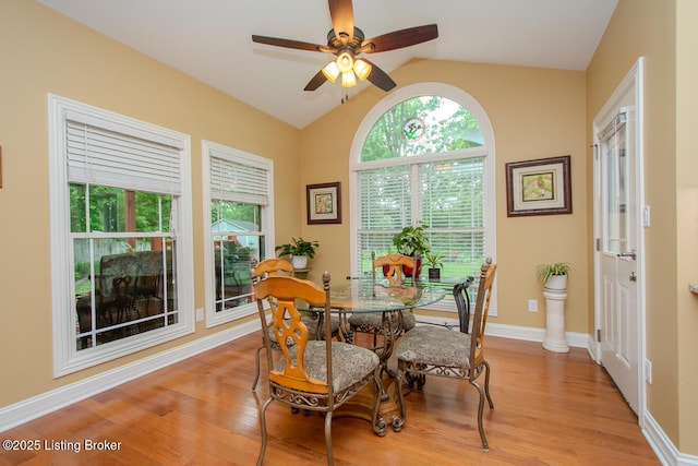 9200 Axminster Dr, Louisville, KY 40299 - dining area featuring vaulted ceiling, light wood-style floors, ceiling fan, and baseboards