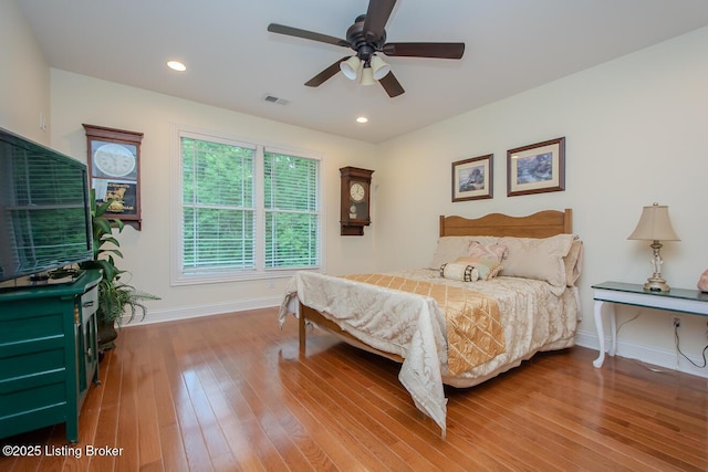 9200 Axminster Dr, Louisville, KY 40299 - bedroom with baseboards, wood finished floors, a ceiling fan, and recessed lighting
