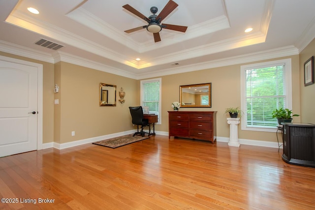 9200 Axminster Dr, Louisville, KY 40299 - office space featuring a tray ceiling, a ceiling fan, light wood-style floors, ornamental molding, and baseboards