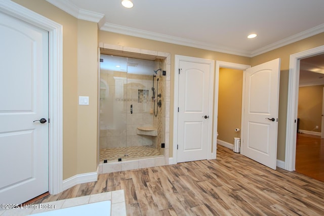 9200 Axminster Dr, Louisville, KY 40299 - full bathroom with a stall shower, wood finished floors, baseboards, recessed lighting, and ornamental molding