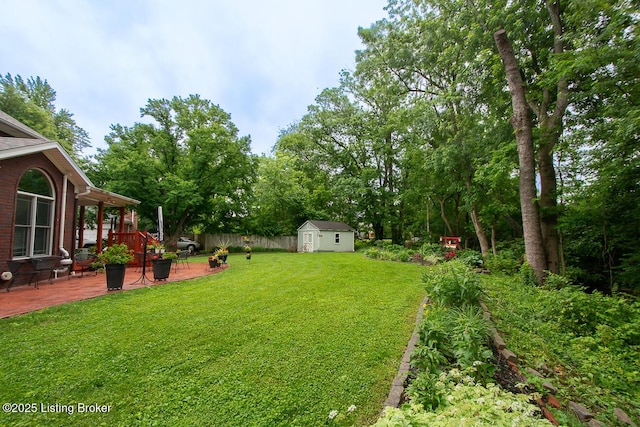 9200 Axminster Dr, Louisville, KY 40299 - view of yard with a patio and view of wooded area