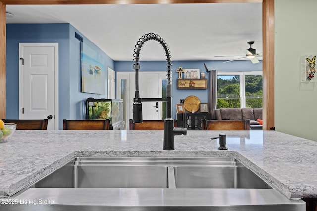 1415 Zoneton Rd, Shepherdsville, KY 40165 - kitchen featuring ceiling fan, open floor plan, and a sink