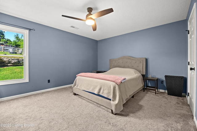 1415 Zoneton Rd, Shepherdsville, KY 40165 - carpeted bedroom featuring baseboards and a ceiling fan