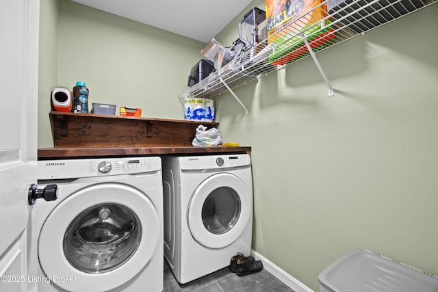 1415 Zoneton Rd, Shepherdsville, KY 40165 - washroom featuring washing machine and clothes dryer, baseboards, and tile patterned floors