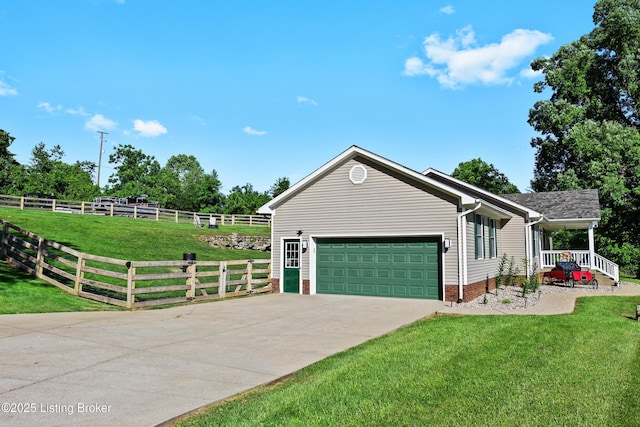 1415 Zoneton Rd, Shepherdsville, KY 40165 - view of front of property featuring concrete driveway, an attached garage, and covered porch