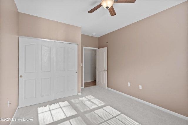 1208 Elderberry Ln, Louisville, KY 40243 - unfurnished bedroom featuring light carpet, a closet, and ceiling fan