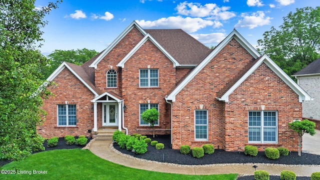 311 Shallowford Pl, Louisville, KY 40245 - traditional home featuring brick siding, a front lawn, and a shingled roof